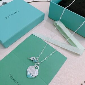 Tiffany & Co. Sterling Silver Heart Tag Necklace with Blue-Green Accents